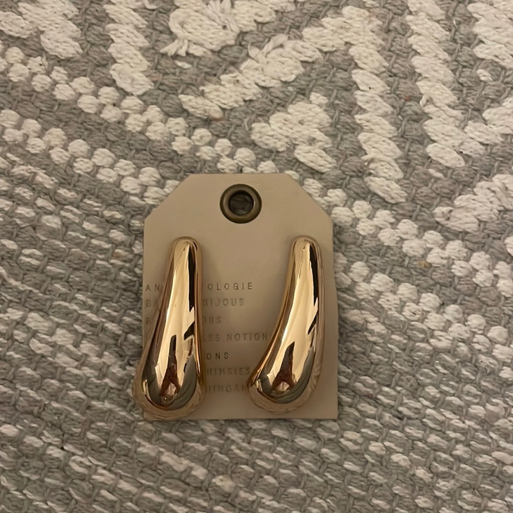 Anthropologie gold tear drop earring